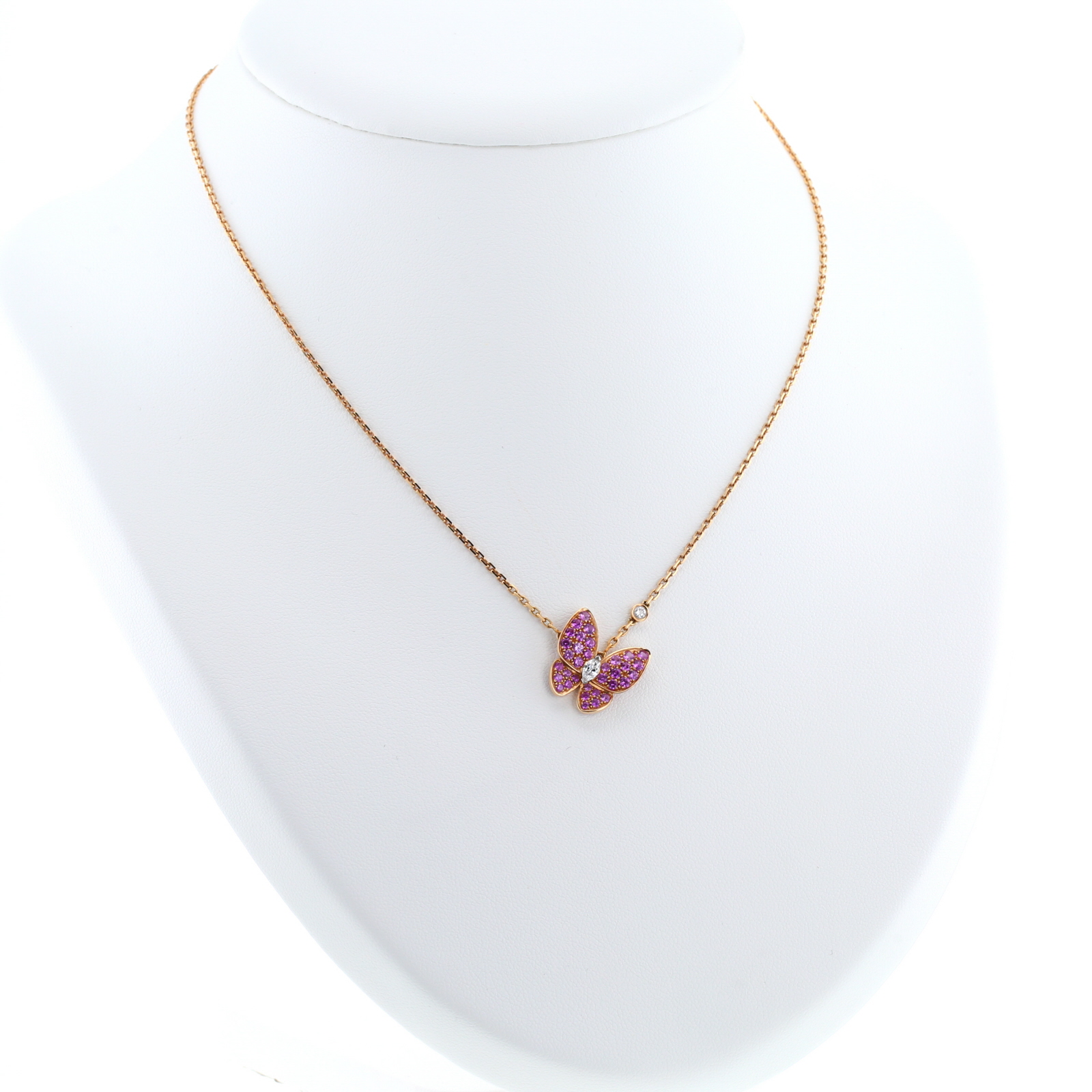 Van Cleef 
Arpels Deux Papillons necklace in pink gold, diamond and sapphires