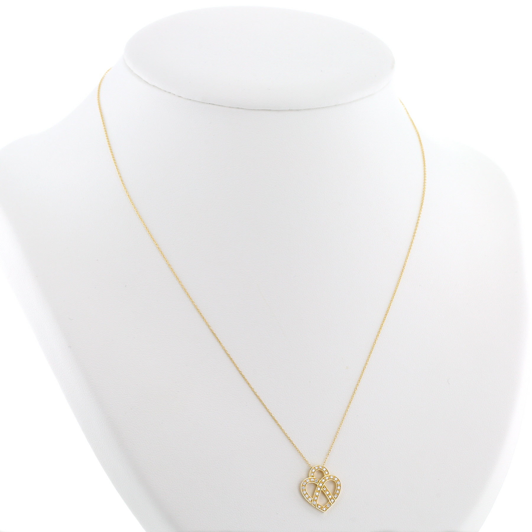 Poiray Coeur Entrelacé pendant in yellow gold and diamonds Poiray Coeur Entrelacé pendant in yellow gold and diamonds