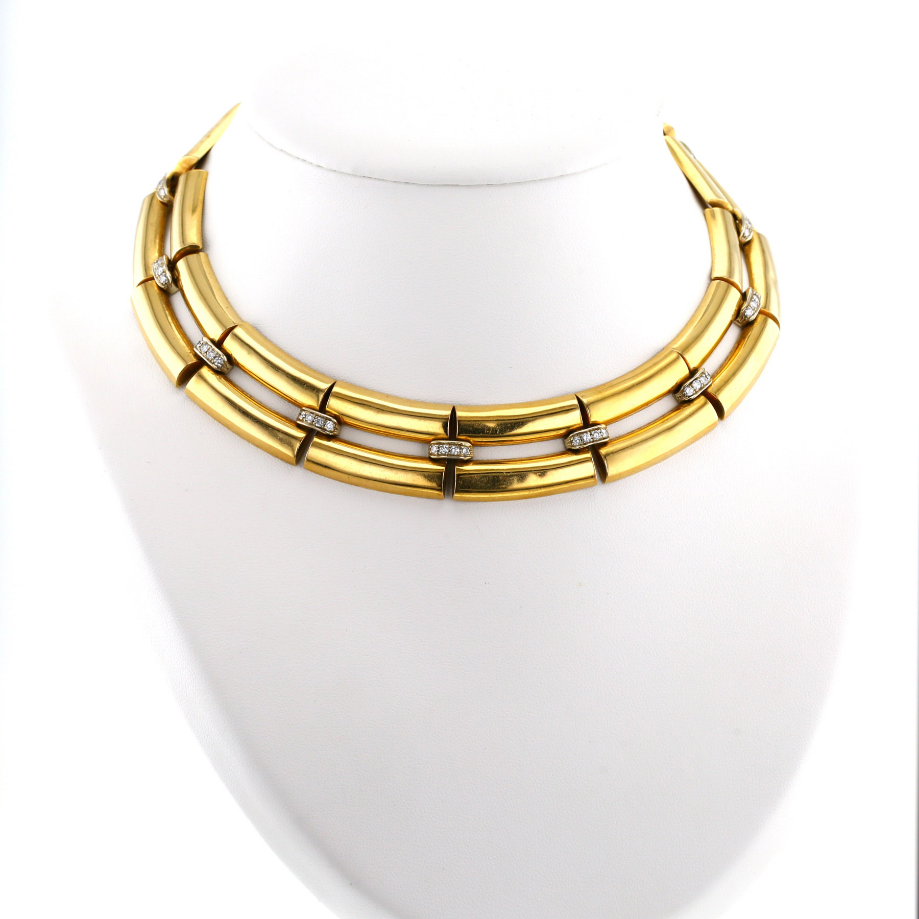 Articulated Repossi   1980's necklace in yellow gold, white gold and diamonds