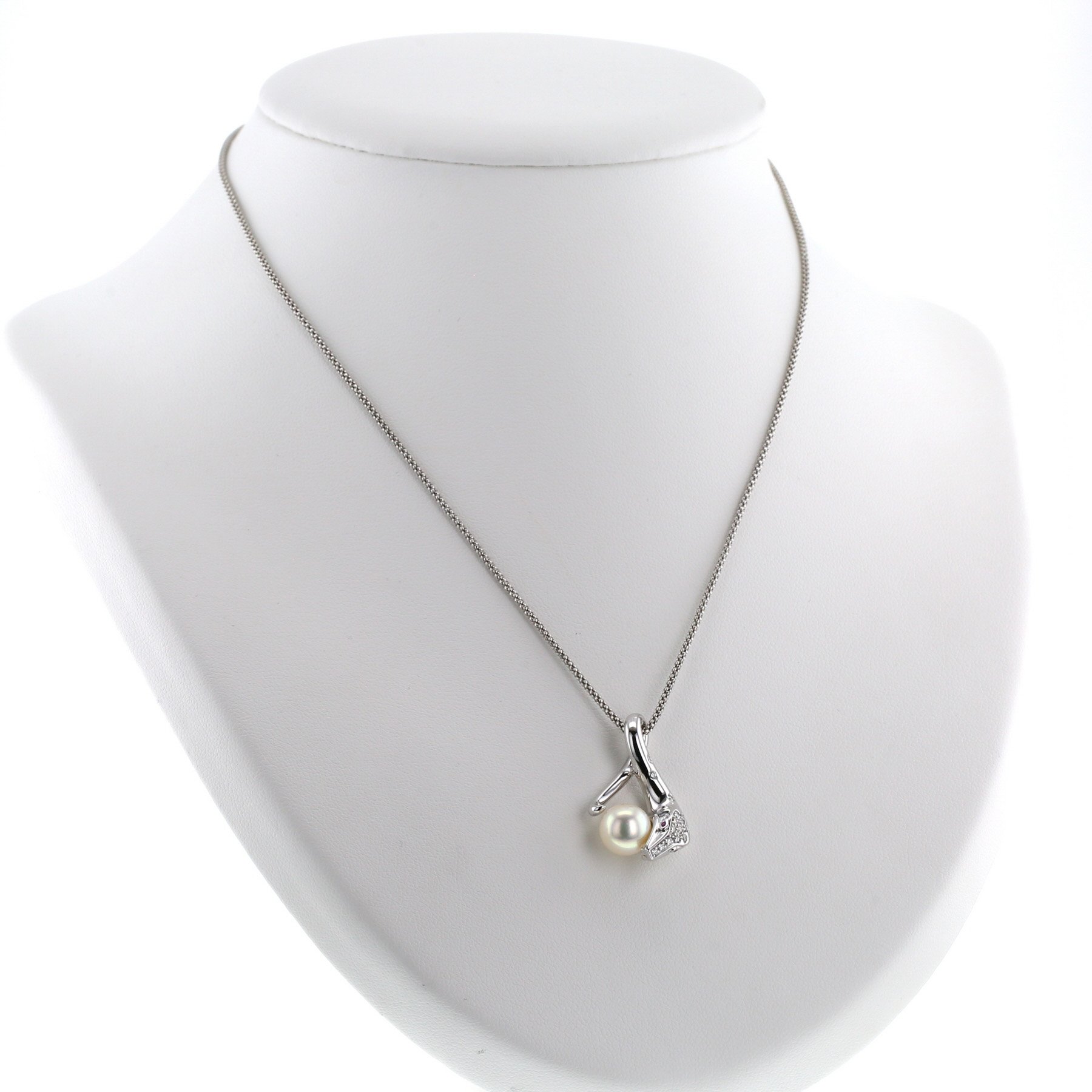 Ciondolo Boucheron Trouble in oro bianco, diamanti e rubini