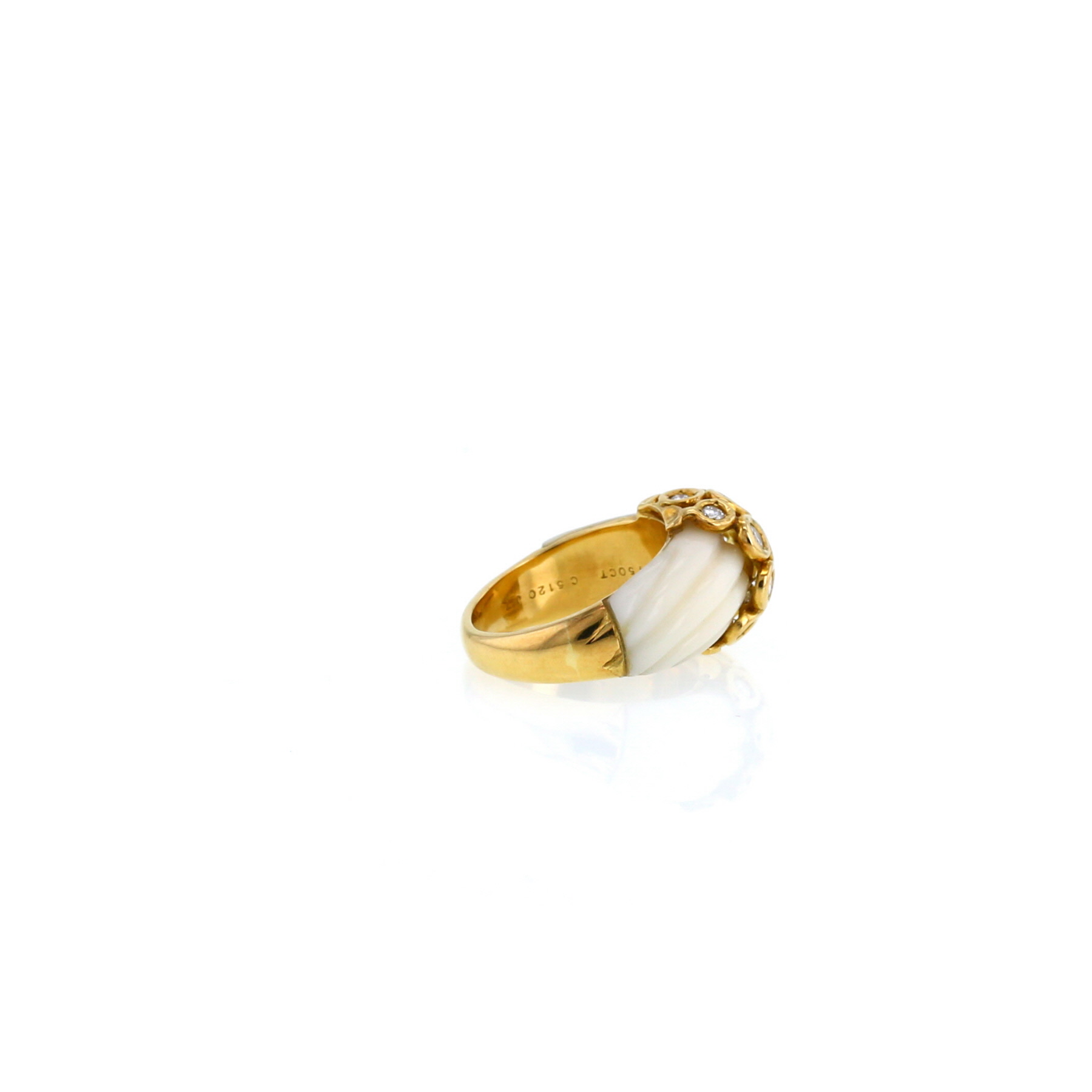 Van Cleef 
Arpels   1960's ring in yellow gold, coral and diamonds