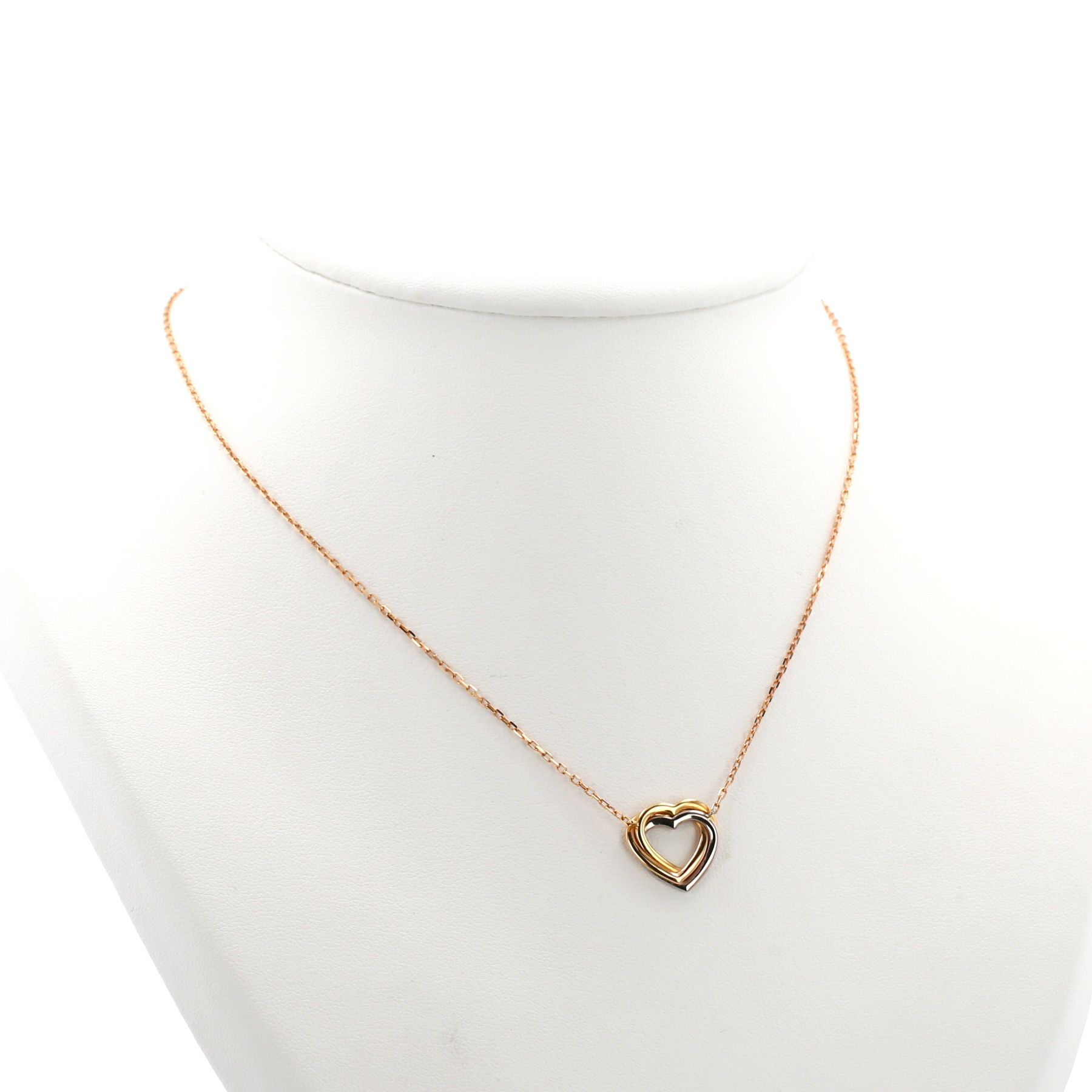 Collier Cartier Coeur Trinity en or jaune, or blanc et or rose