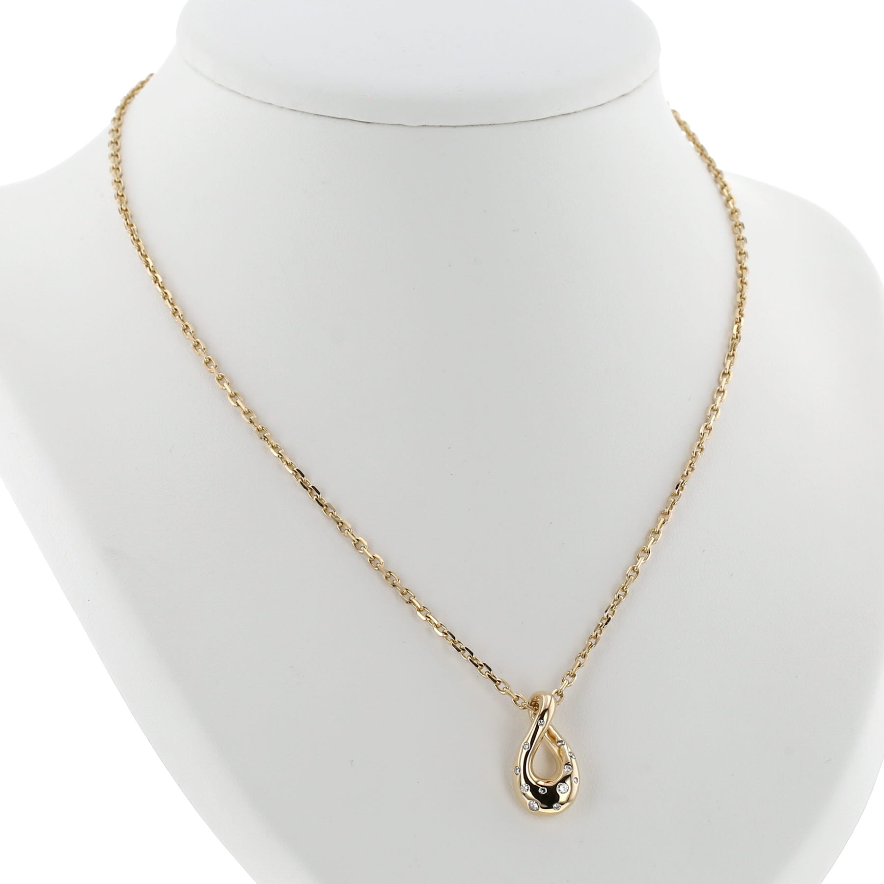 Pendentif Fred Mouvementée en or jaune et diamants