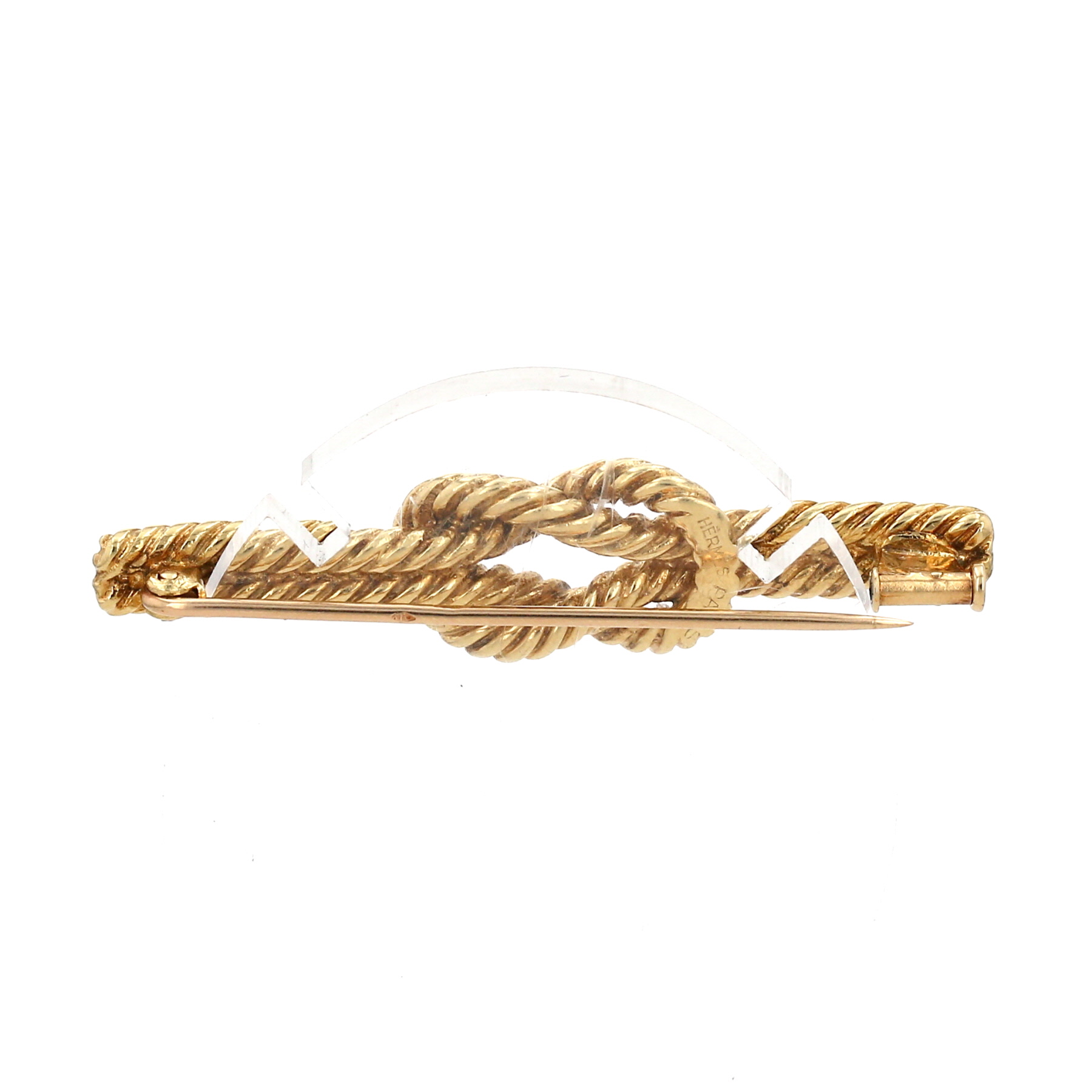 Hermès  brooch-pendant in yellow gold