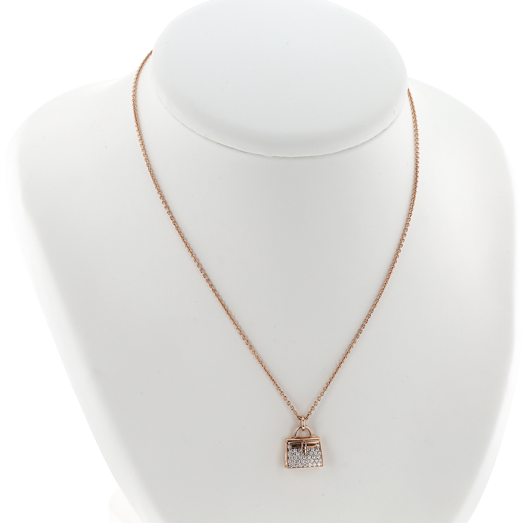 Collier Hermès Amulettes Kelly en or rose et diamants