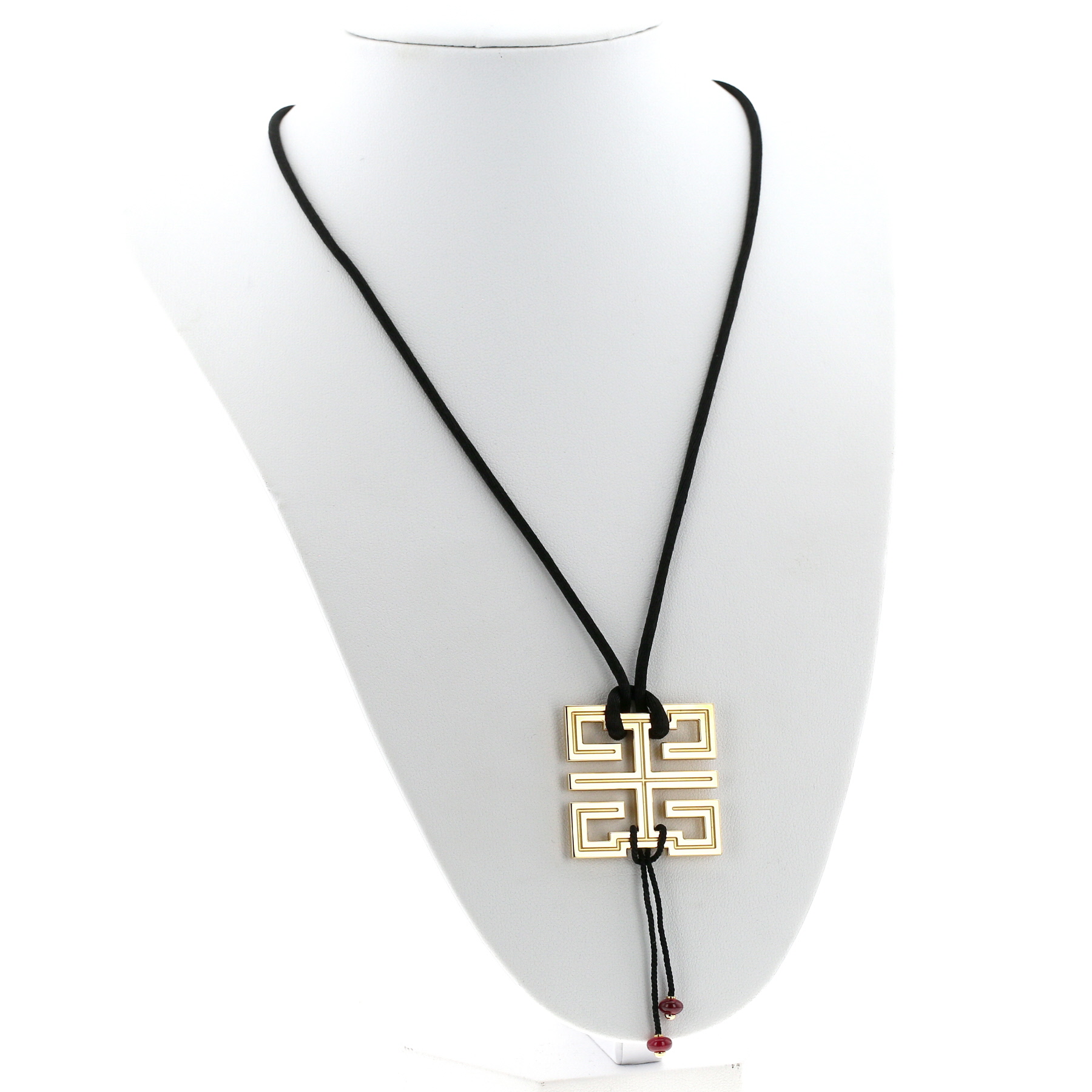 Cartier Le Baiser du Dragon pendant in yellow gold and ruby
