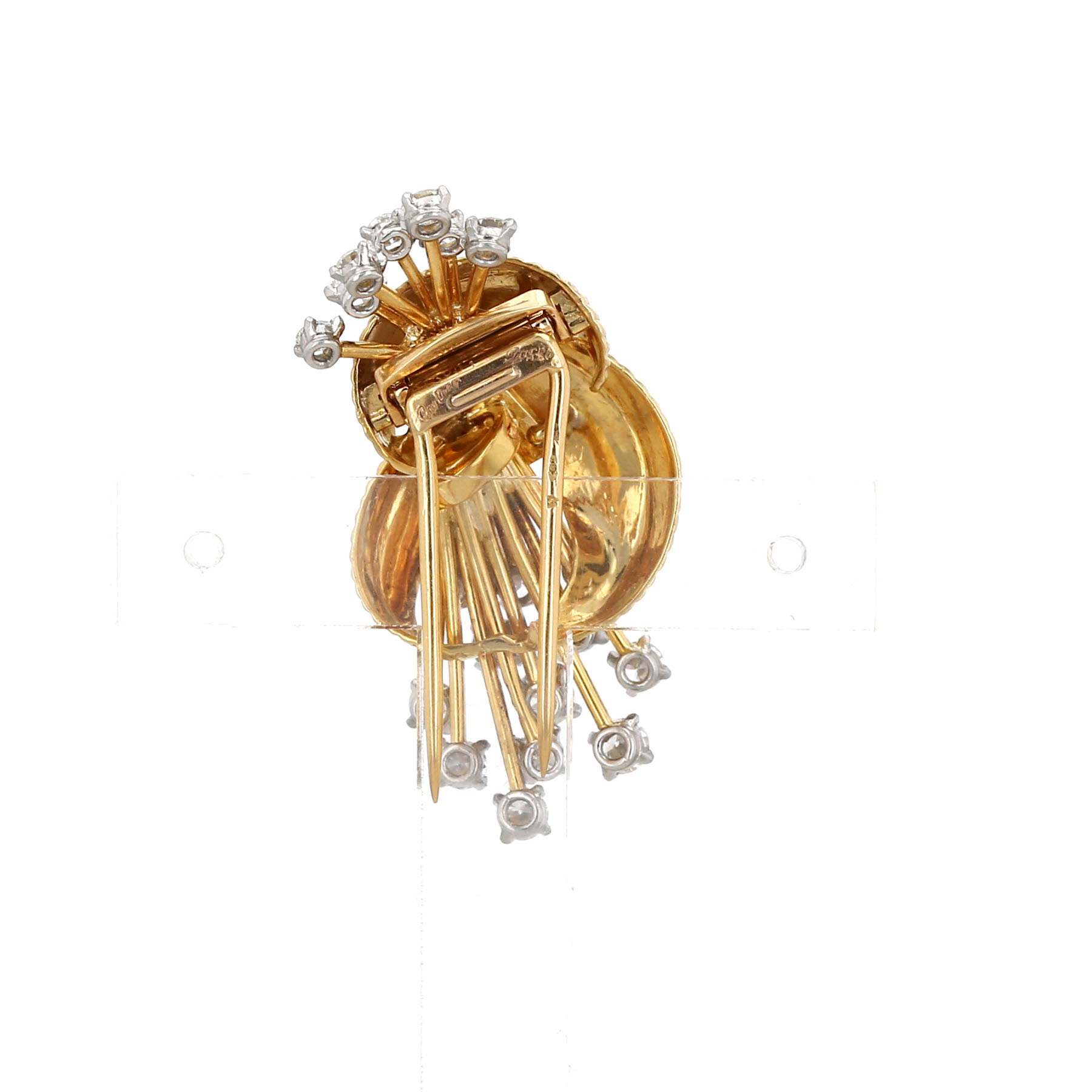 Cartier   1960's brooch in yellow gold and diamonds