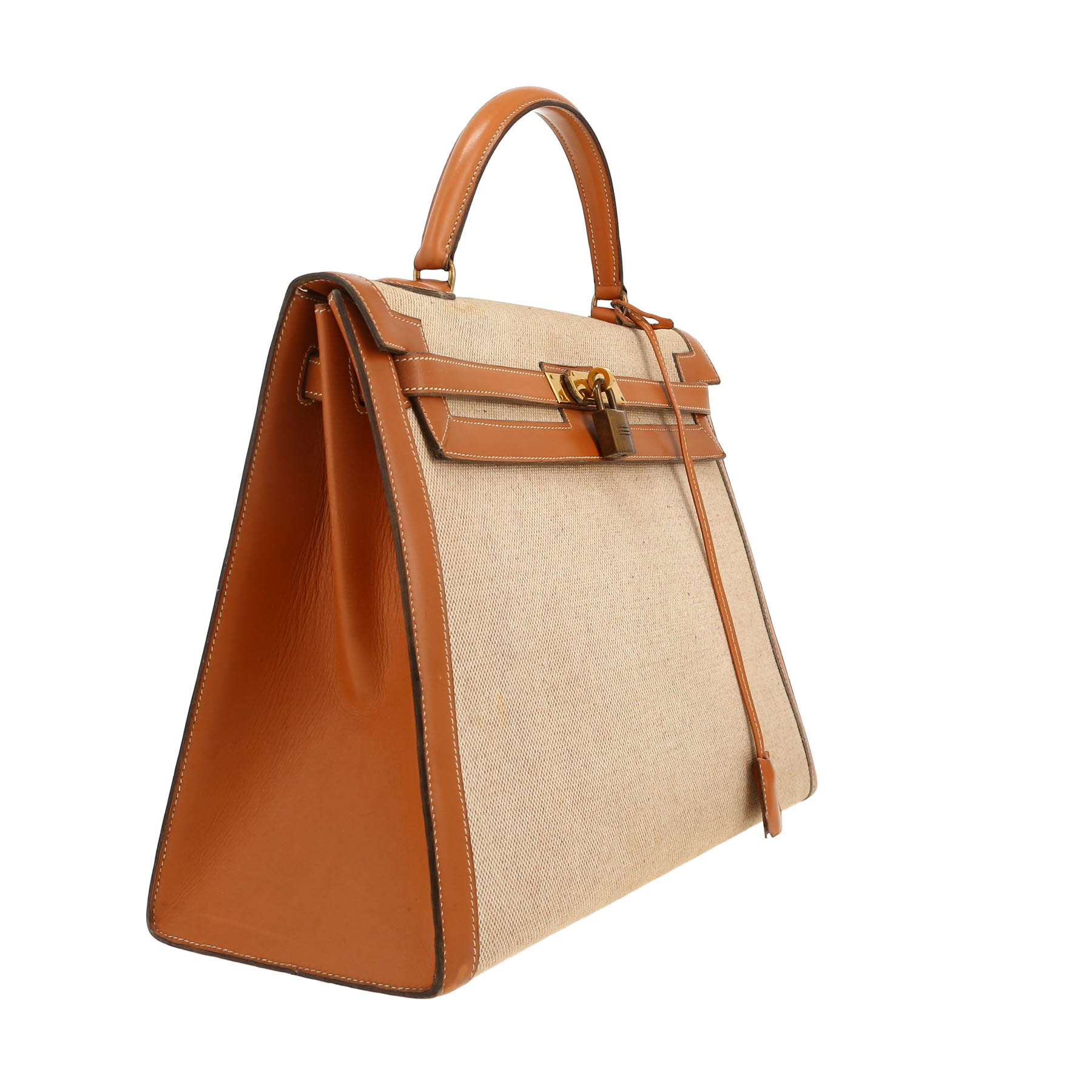 Hermès  Kelly 35 cm handbag  in gold Chamonix  leather  and beige canvas