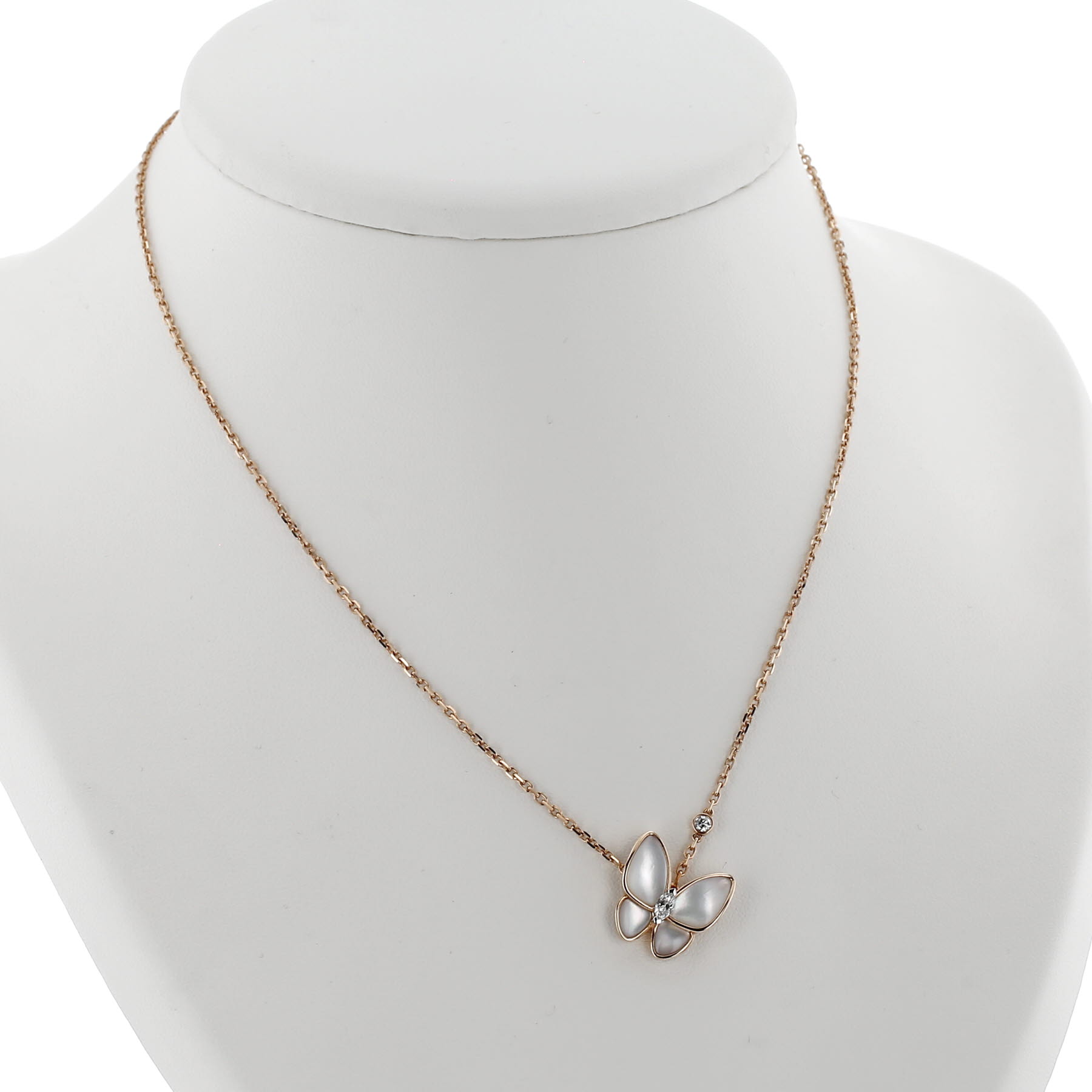 Van Cleef 
Arpels Deux Papillons necklace in pink gold, mother of pearl and diamonds