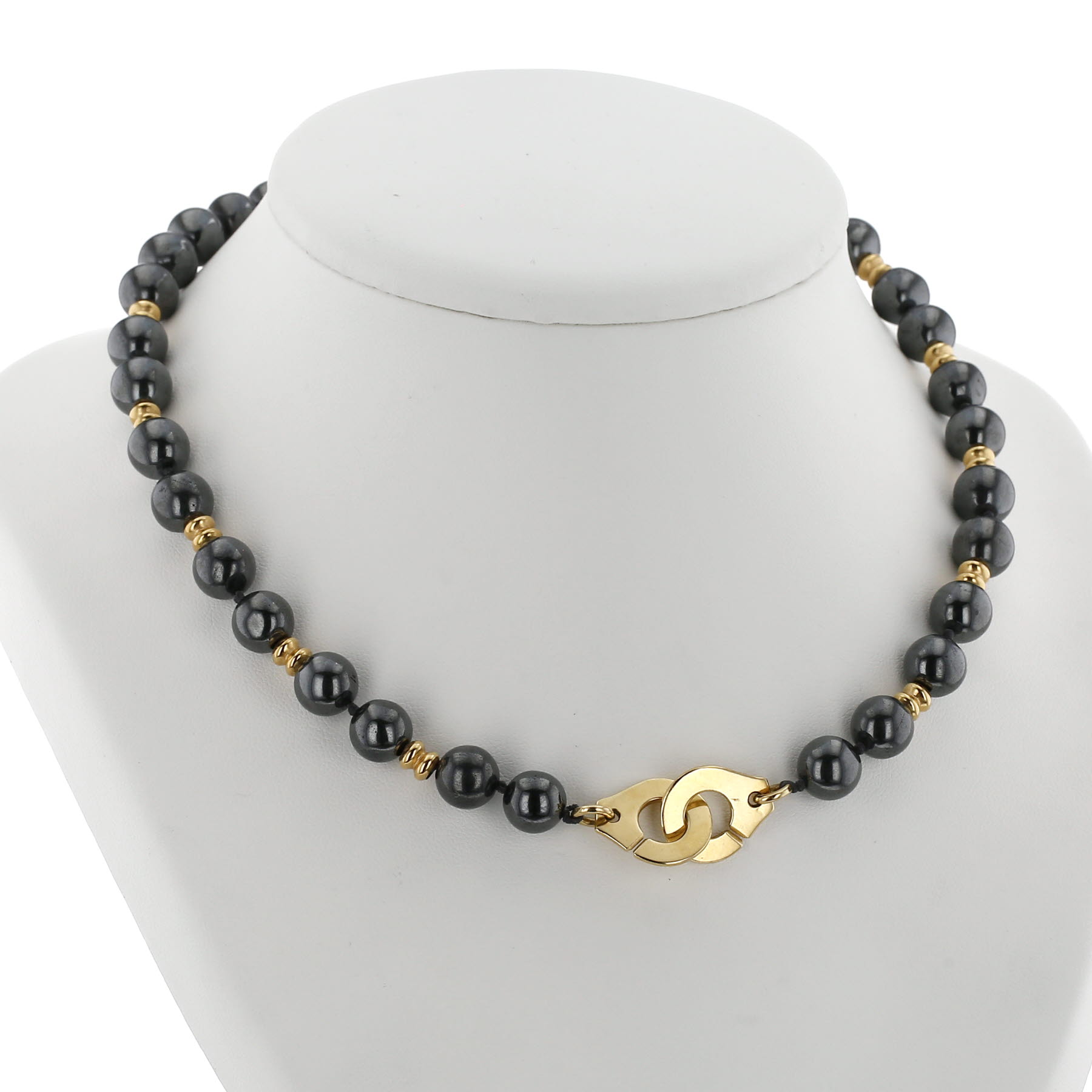 Collana Dinh Van Menottes R15 in oro giallo e hematite