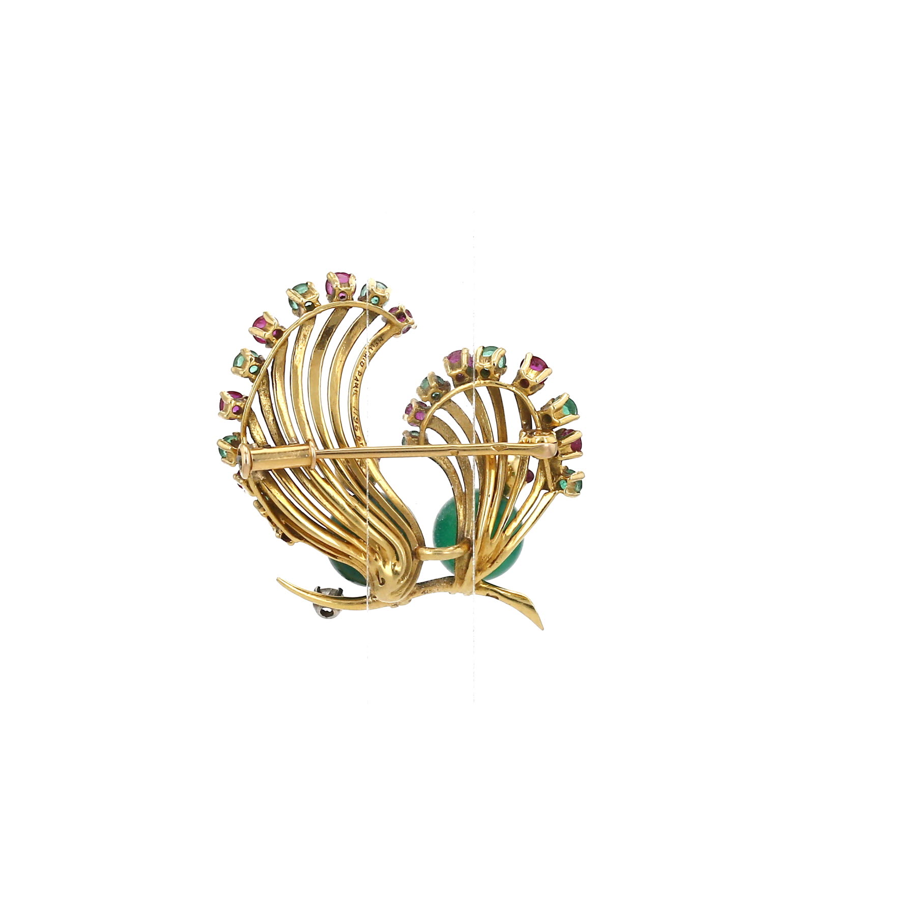 Spilla Mellerio  in oro giallo, crisoprasio, rubini, smeraldo e diamante