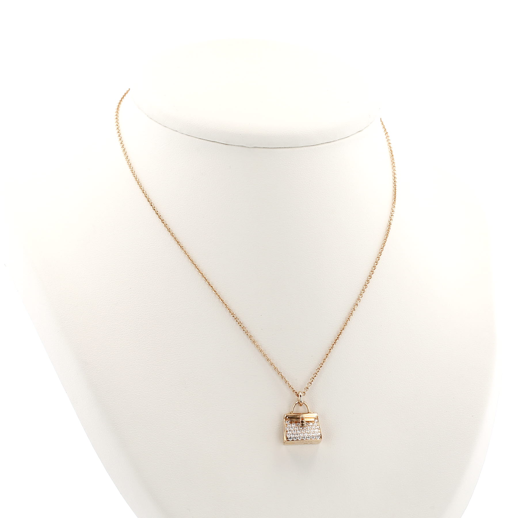 Collier Hermès Amulettes Kelly en or rose et diamants
