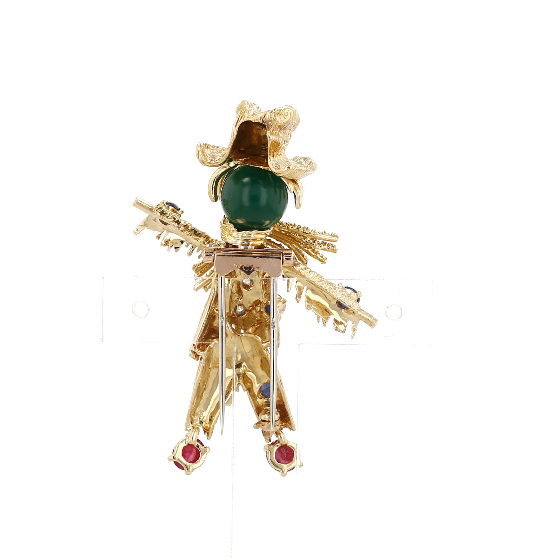 Broche Van Cleef 
Arpels de oro amarillo, diamantes y piedras de colores