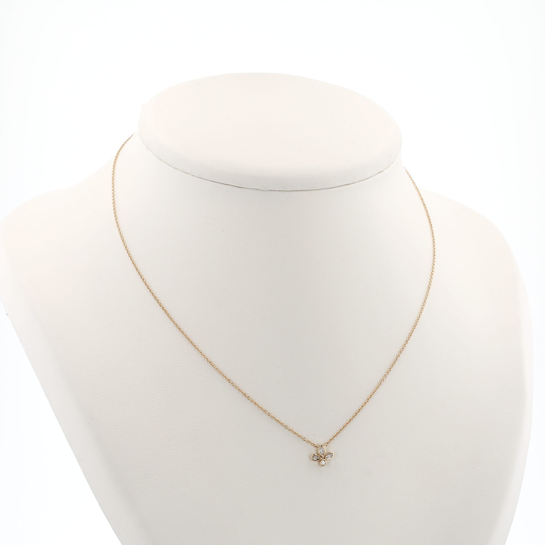 Tiffany 
Co Fleur de Lis necklace in yellow gold and diamondsand in diamonds