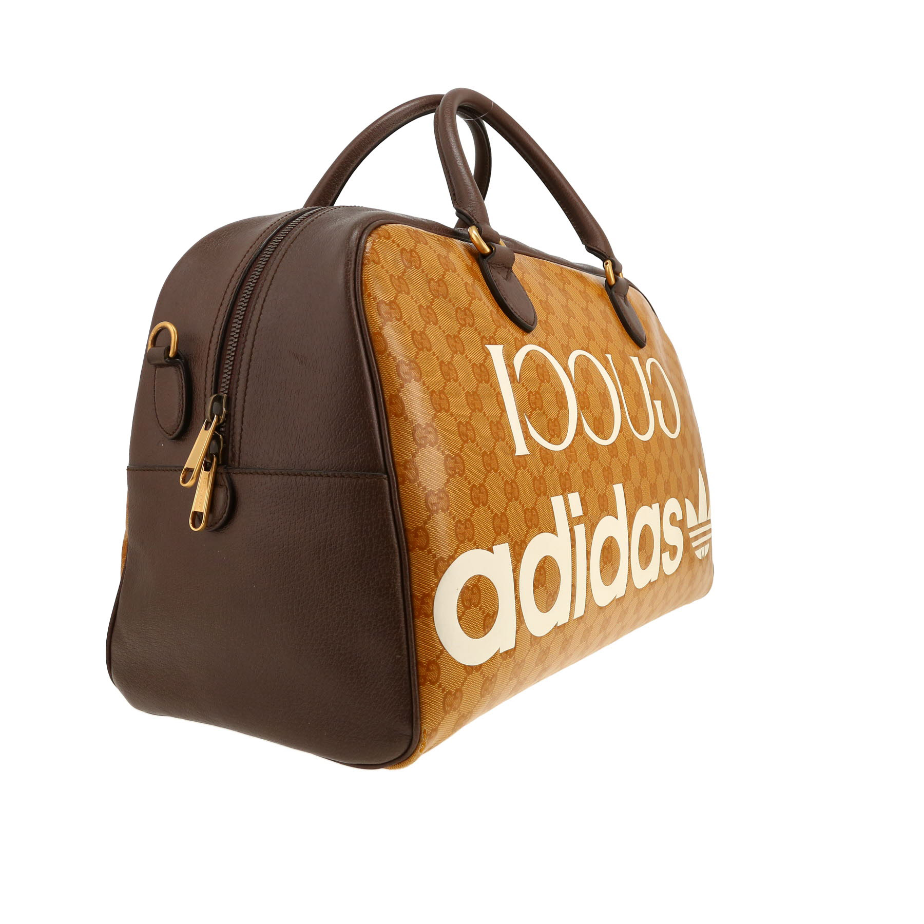 Gucci   travel bag  in orange "sûpreme GG" canvas  and brown leather