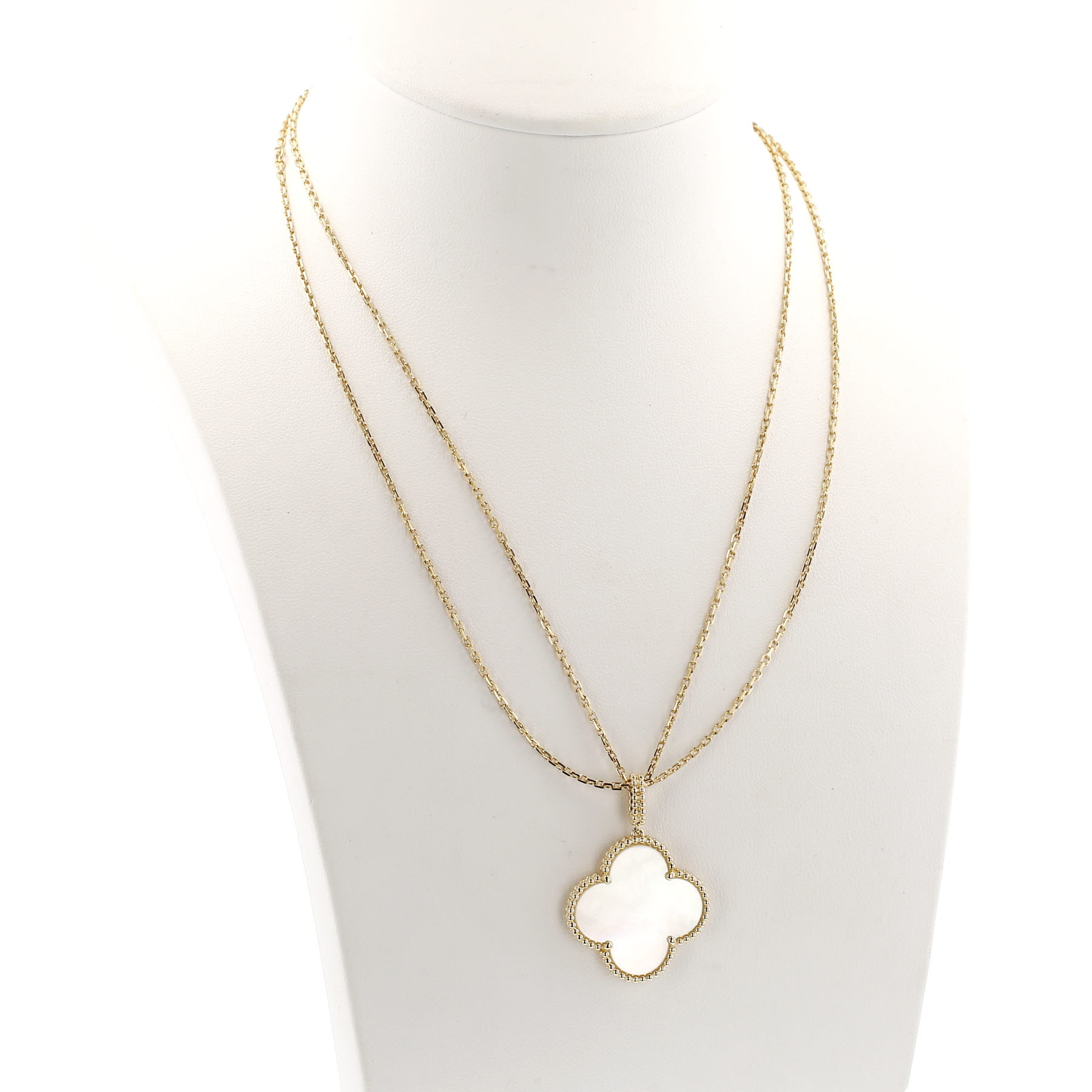 Van Cleef 
Arpels Magic Alhambra long necklace in yellow gold and mother of pearl