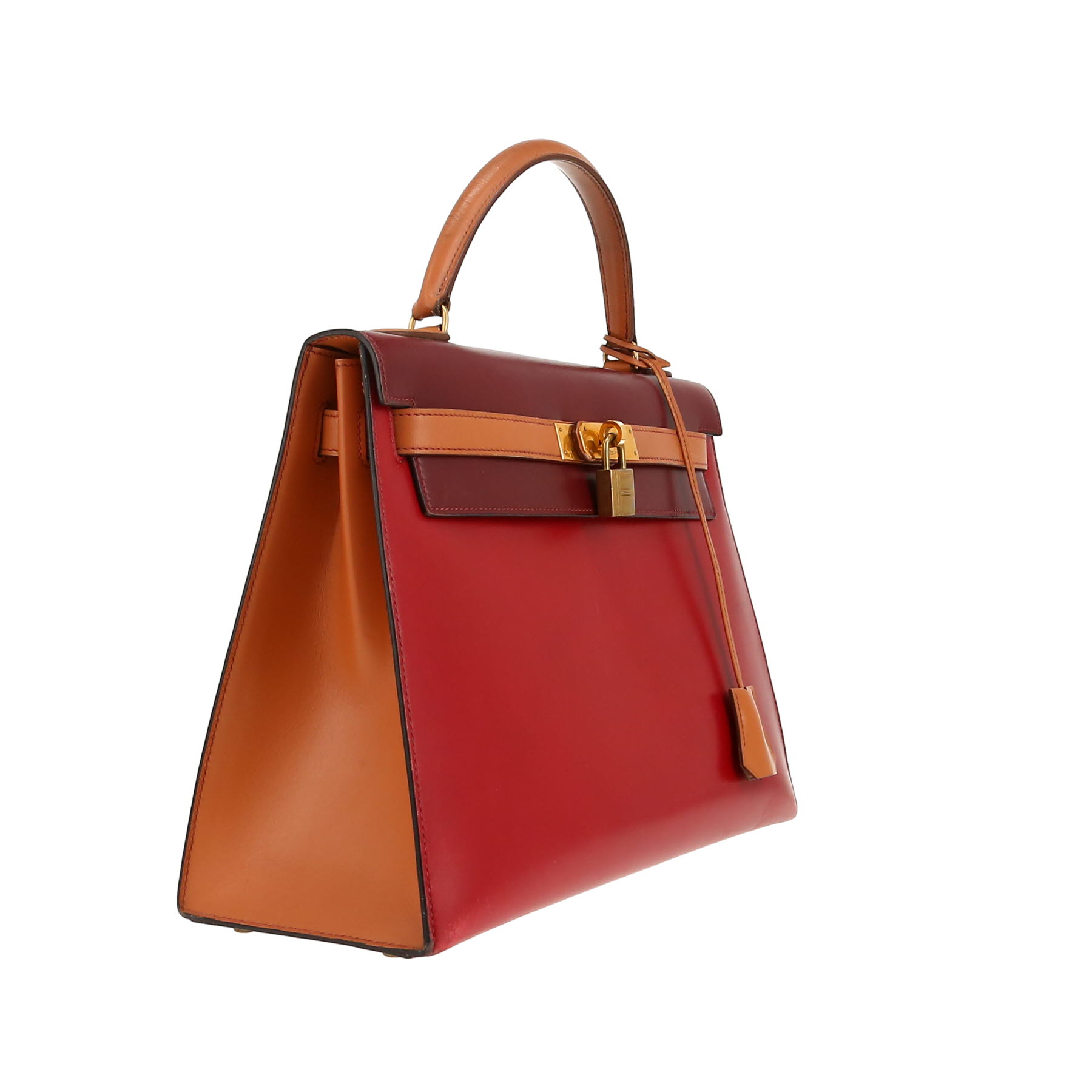 Hermès  Kelly 32 cm handbag  in burgundy, red and gold box leather