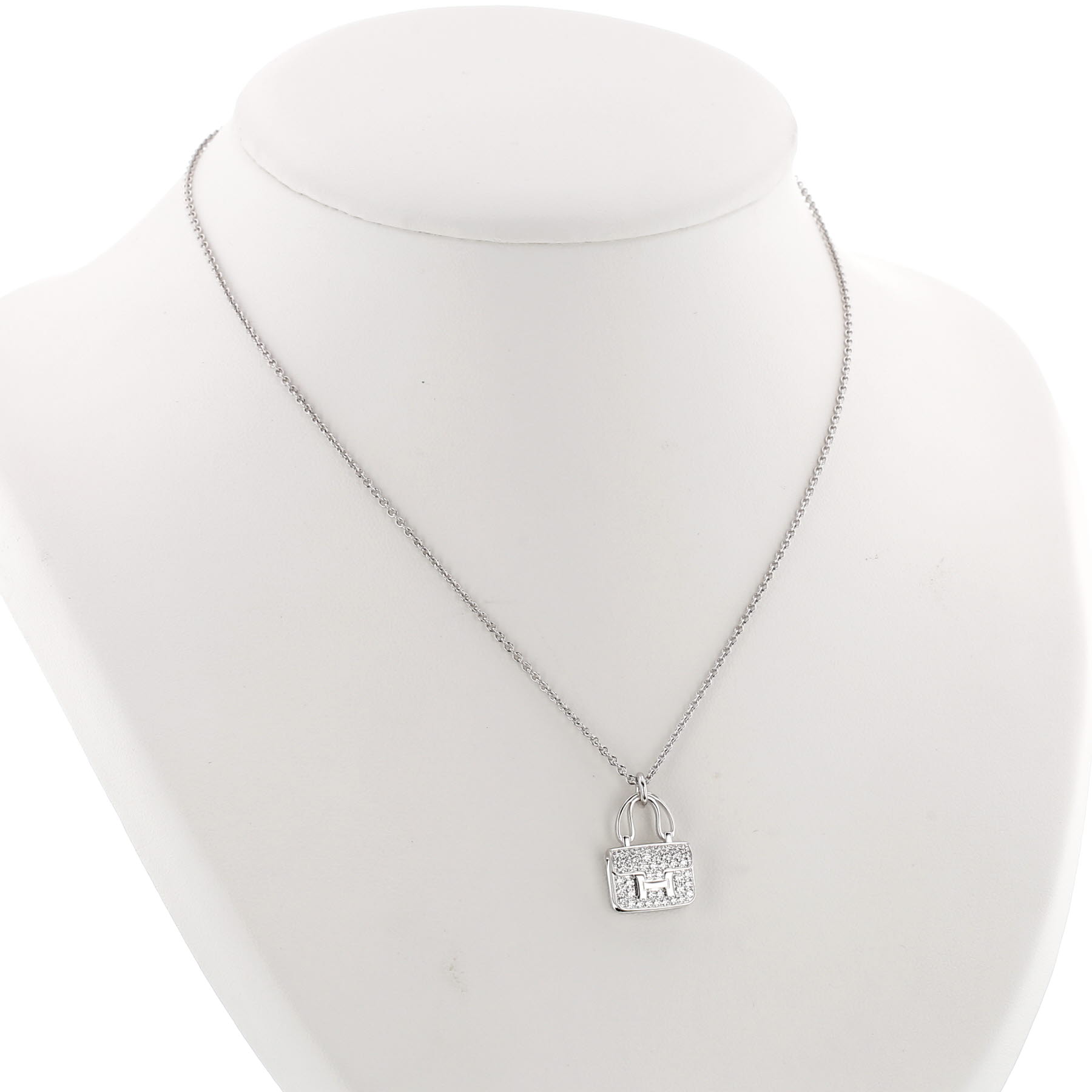 Colgante Hermès Amulettes Constance de oro blanco y diamantes