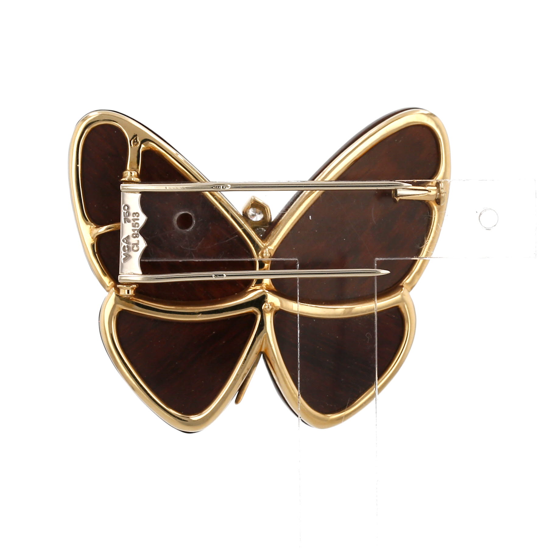 Van Cleef 
Arpels Papillon clip in yellow gold, diamonds and snakewood