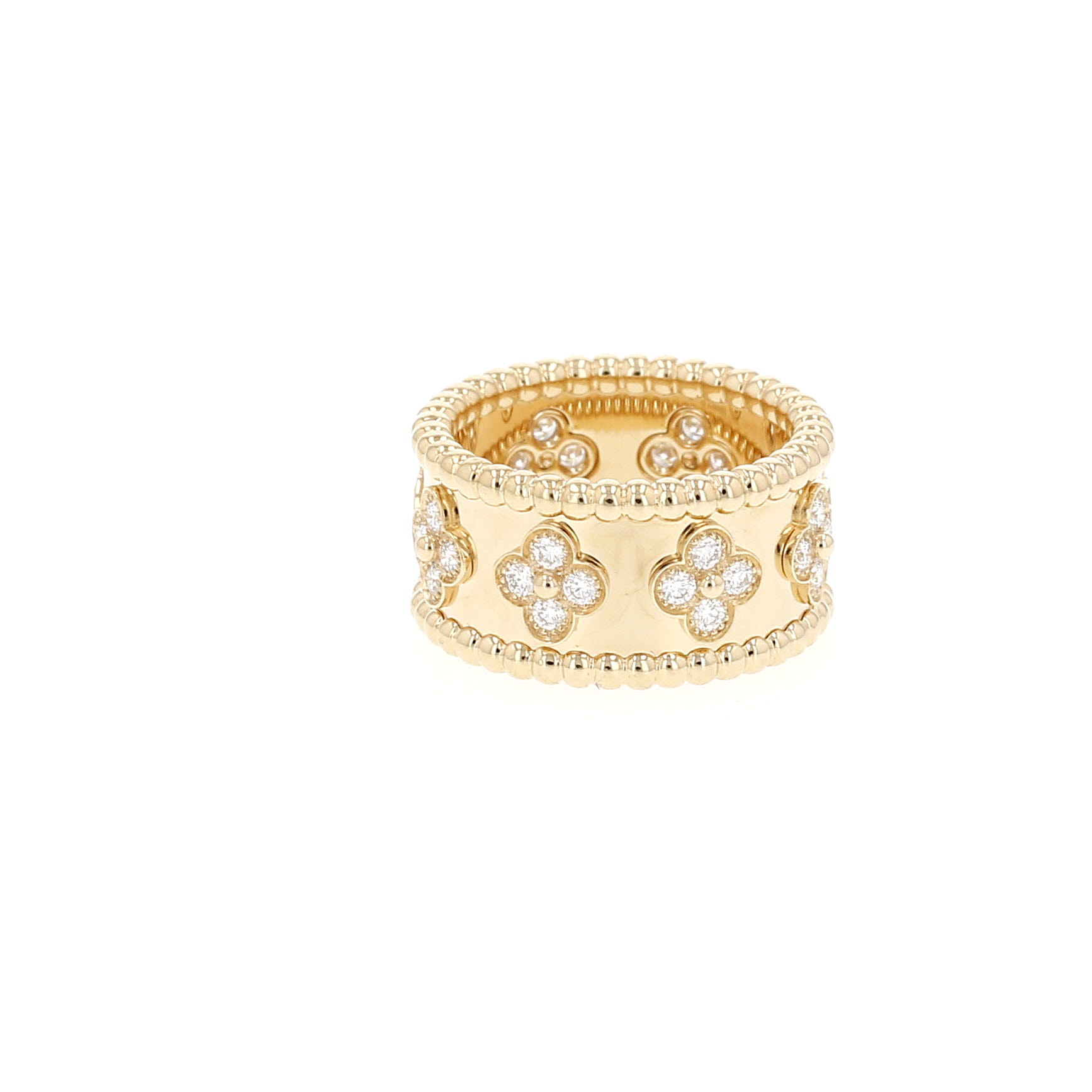 Van Cleef 
Arpels Perlée Trèfle medium model sleeve ring in yellow gold and diamonds