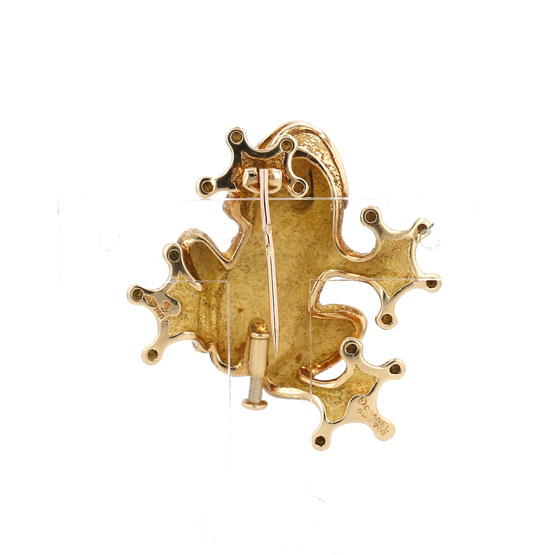 Broche Chanel grenouille en or jaune et onyx