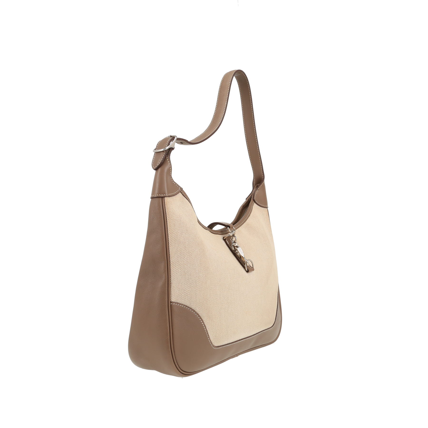 Hermès  Trim bag worn on the shoulder or carried in the hand  in beige canvas  and etoupe leather