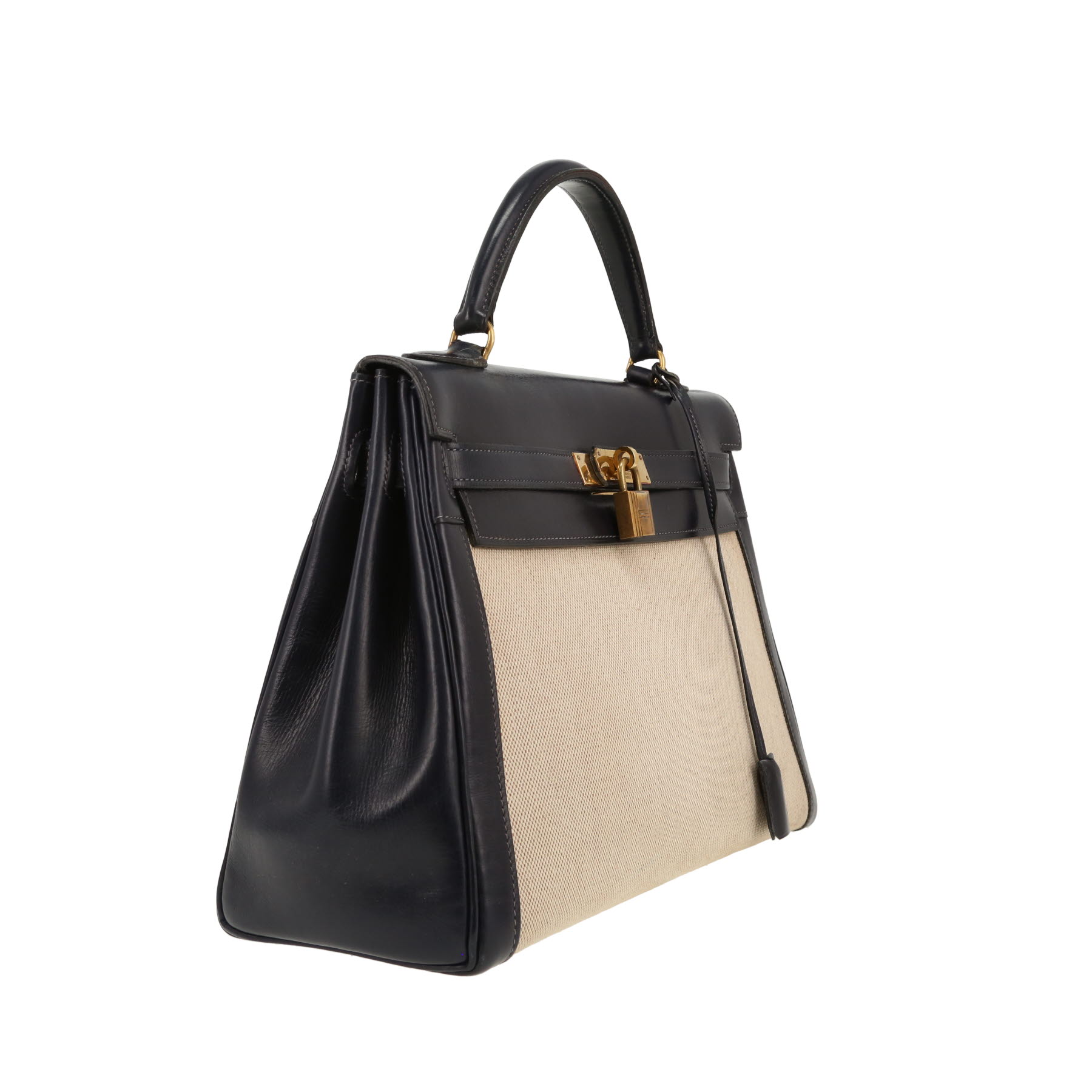 Hermès  Kelly 32 cm handbag  in navy blue box leather  and beige canvas