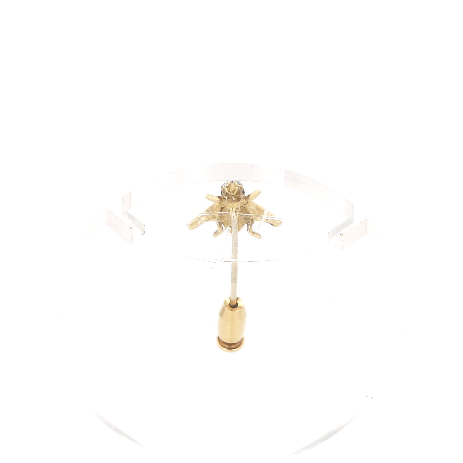 Piaget tie pin in yellow gold, diamonds, emerald and onyx