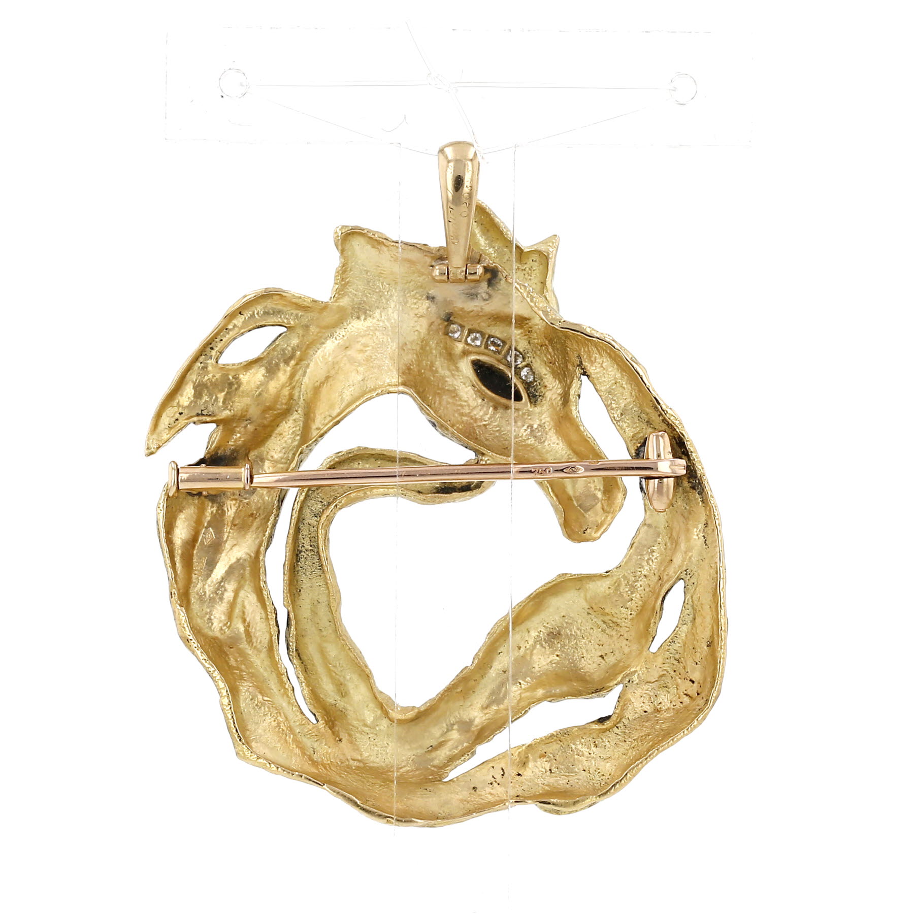 A 1970s Cartier brooch-pendant in yellow gold, onyx and diamonds