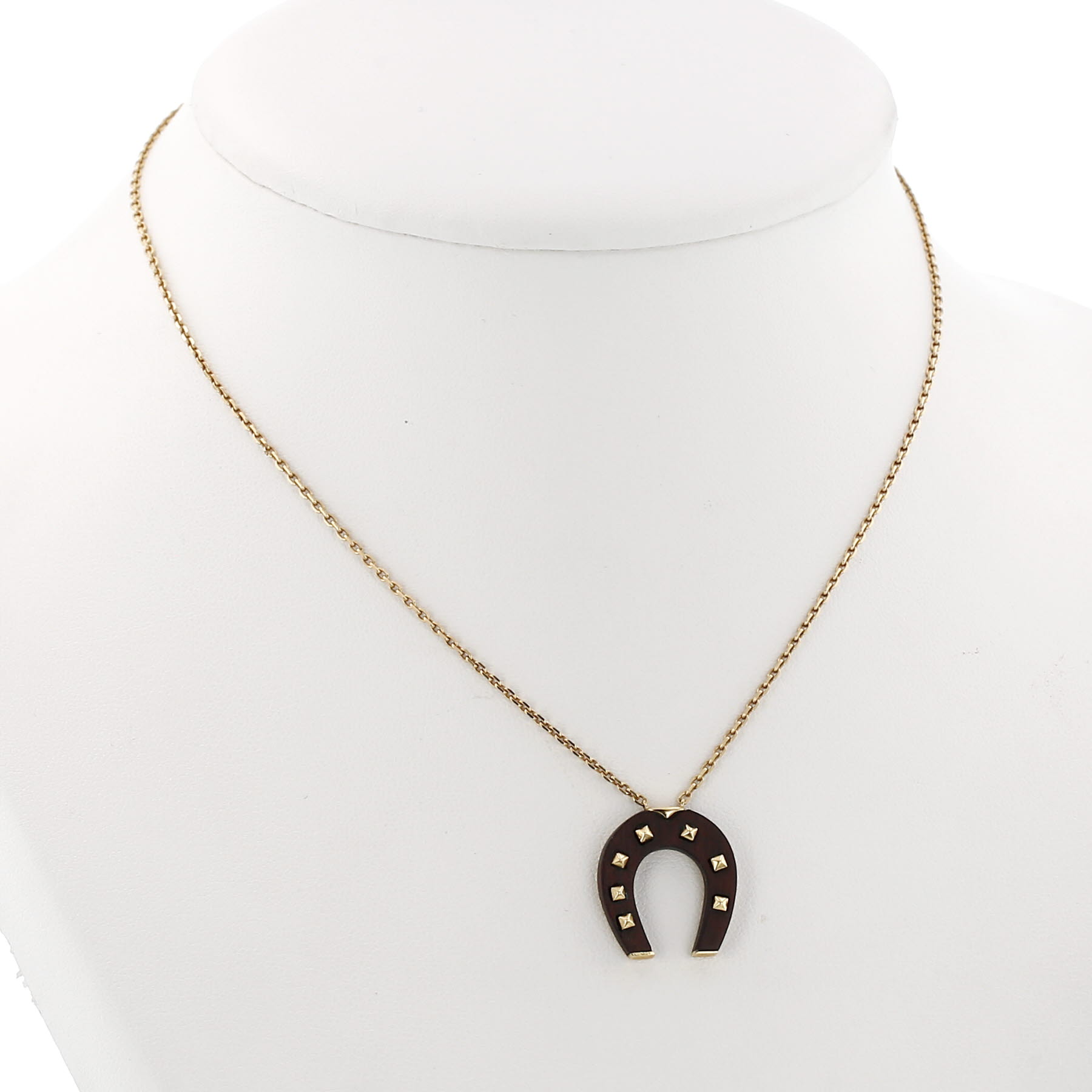 Van Cleef & Arpels Touch Wood necklace in yellow gold and snakewood