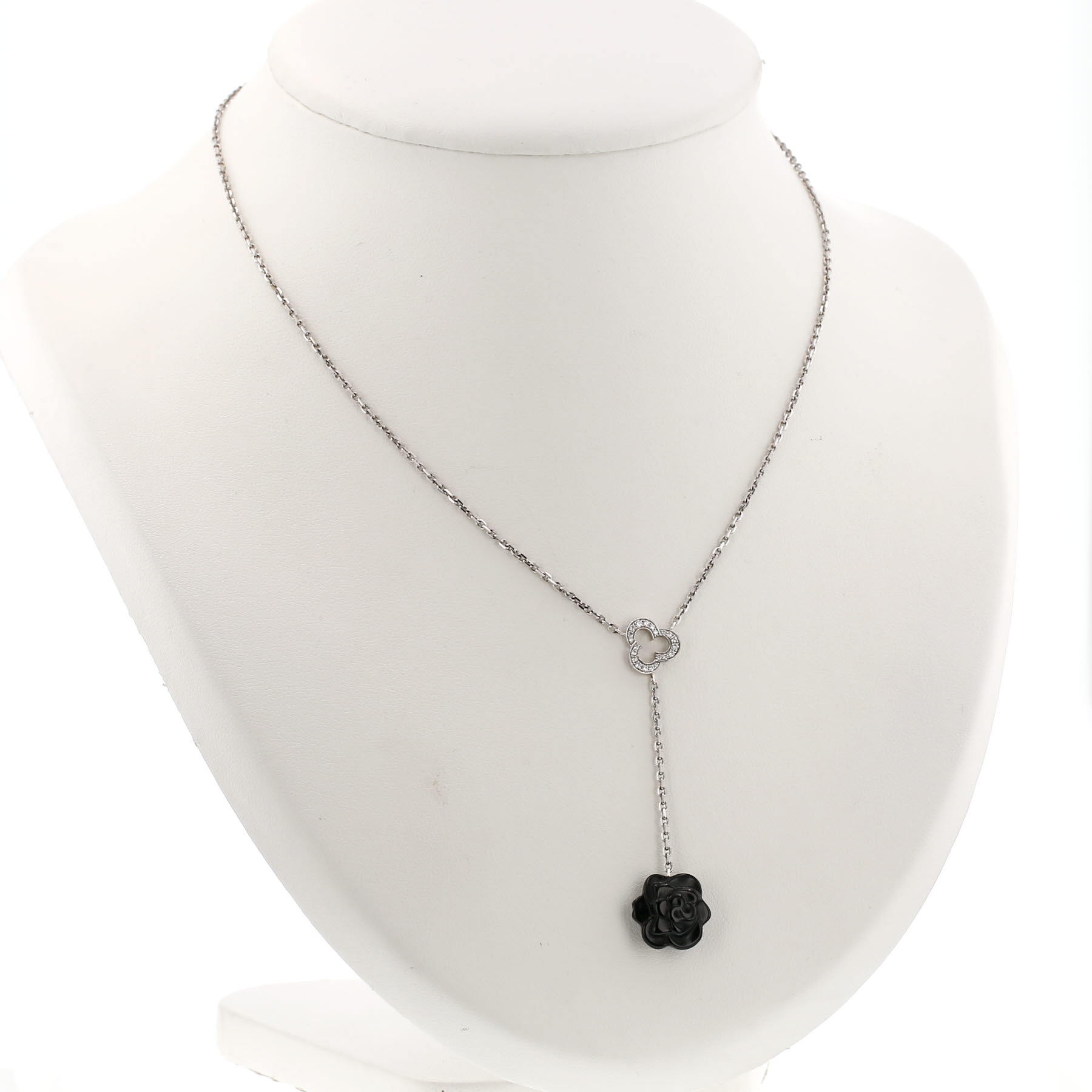 Chanel Camelia necklace in white gold, onyx and diamonds