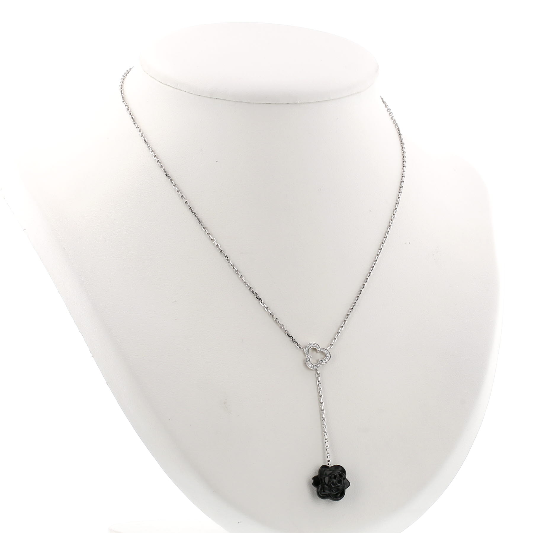 Chanel Camelia necklace in white gold, onyx and diamonds