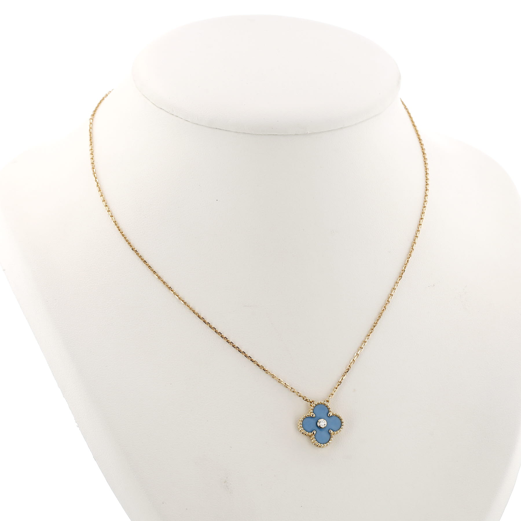 Van Cleef & Arpels Alhambra pendant in yellow gold, porcelain and diamond