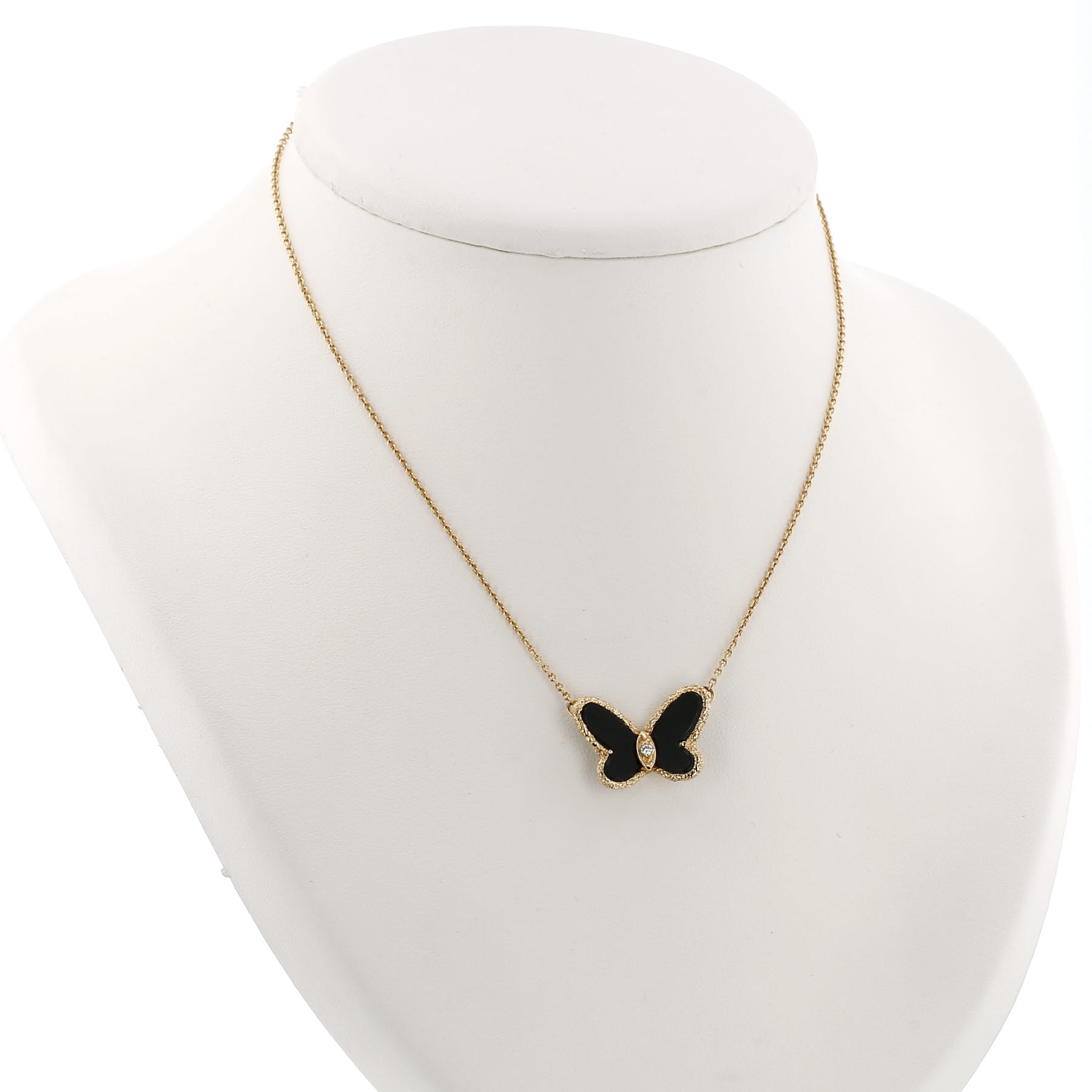 Van Cleef & Arpels necklace in yellow gold, diamonds and onyx