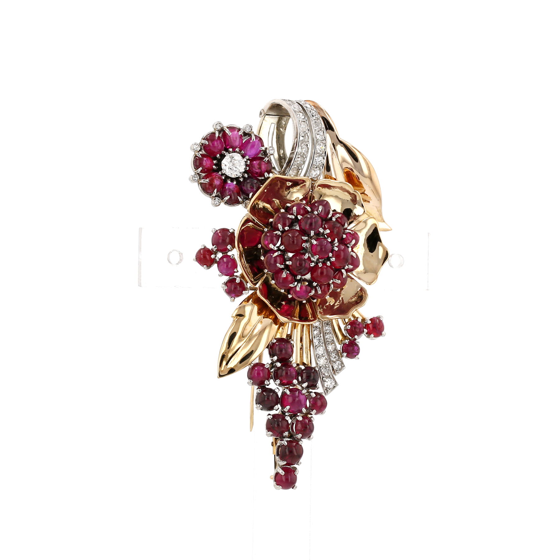 A semi-articulated 1950s Boucheron Paris brooch-pendant in yellow gold, platinum, synthetic rubies and diamonds